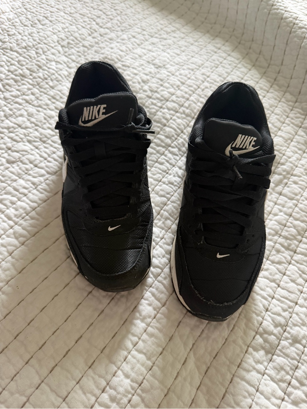 Nike Women's Black Low-Top Sneakers with White Swoosh
